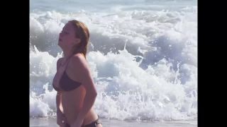 Busty ginger girl enjoys big waves in the water Nudism-3