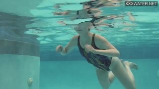 Brunette Emie Amfibia masturbates hard underwater-1