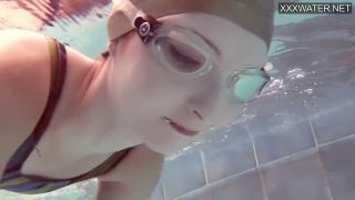 Brunette Emie Amfibia masturbates hard underwater-5