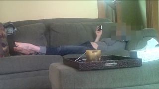 Horny girlfriend fingering pussy while watching phone porn on the couch. spy cam - Masturbation-1