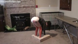 Diaperedonline2Lucy Lucy Plugged  Spanked in Standing Stocks-9