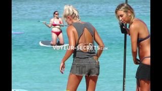 Hot beach girls paddle their surfboard-0