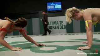 Blond Fitness model & gorgeous brunette battle it out on the mat. Loser gets fucked, must lick pussy Femdom!-0