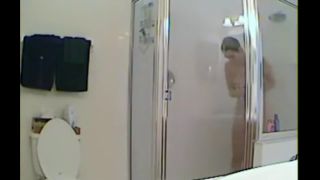 cute busty girl taking a shower and shaving legs and pussy. hidden cam-2