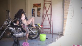 Tattooed Motorcyclist Fingers And Toys Her Hairy Pussy In The Garage.-2