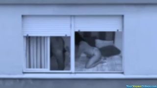 Mature couple fucking by the window-1