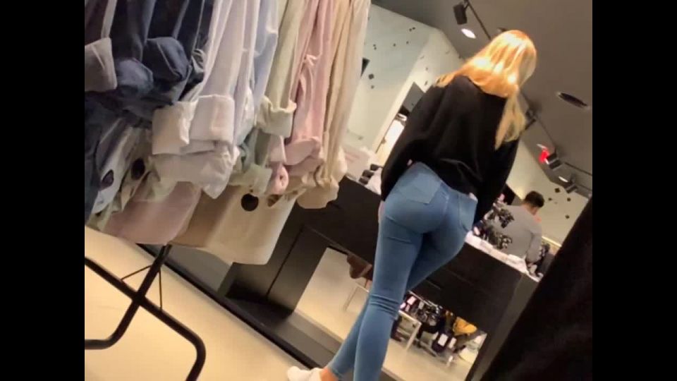 Hot store clerk girl's crotch is squished in tight jeans