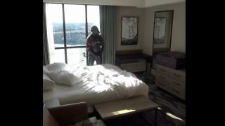 Solo Male double cocked orca jerks off and cums into used condom at hotel window-3