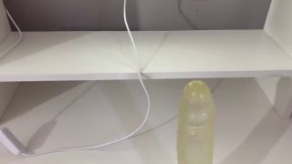Dildo I give a handjob to the dildo with oily hands in medical white gloves-1
