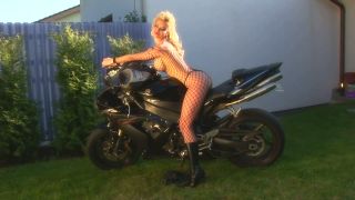 Blonde Bombshell Caylian Curtis Is A Biker'S Dream In Fishnet Solo Scen-1