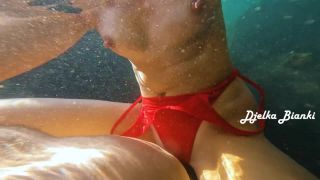 DjelkaBianki in Amateur Couple Fucks in the Sea on the Beach 1080p ...-3