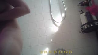 Girl bends over right in front of hidden shower cam!-1