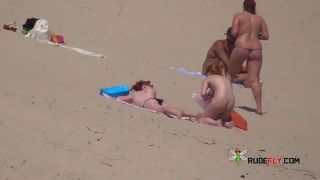 Her sexy body gets a tan after she strips naked  6-1