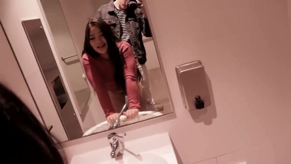 Asian slut fucks in public bathroom with no shame