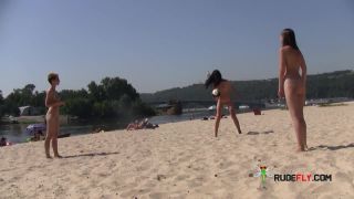 Teen nudist only wears her sunglasses to the  beach-1