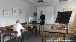 Governess Kenworthy in the school room with a strap-0