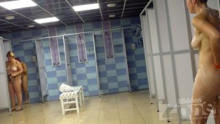 Hidden-Zone.com- Sh1419 One of the girls wipes by towel her large white chest near Hidden cam shower. It is truly -0