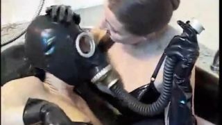 Latex Domme. Latex domme punishing her latex slave with whipping and pussy fisting-9