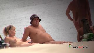 Barely legal youthfull naturist lays naked at the plage 3-4