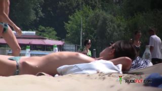 Gorgeous nudist youth gets an all over tan  3-8