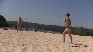 Slim teen with perky boobs naked at a nudist  beach-6