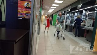 Voyeur 11155-Blonde in a red dress-0