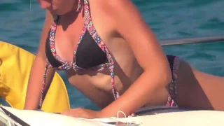 Downblouse - blonde teen flashing her small white boobs tanning on boat - voyeur - blonde porn -7