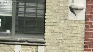 spying-across-the-street-neighbor-window_9820303_-3