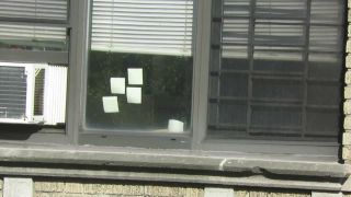 spying-across-the-street-neighbor-window_9820303_-7