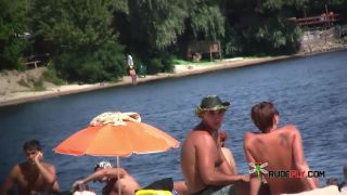 Curvy youthfull naturist lets the sun kiss her body  2-4