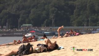 Caught cumming on nude beach!-7