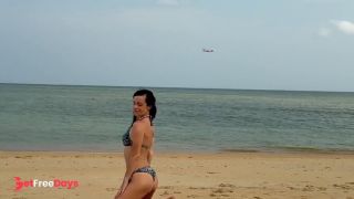 A girl in a bikini is swimming in the sea. Do you want to be my guide-9