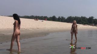 Dark haired nudist beach teen gets an all over  tan-7