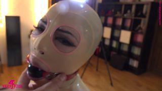 Getting spanked latex Doll-0