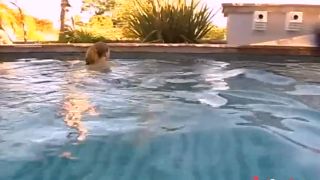 Sexy brunette Nikki Nievez fucks her cock by the pool-1