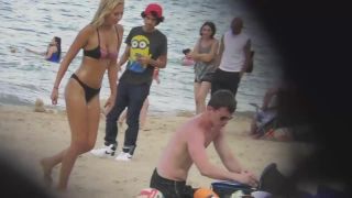 Silly blond girl gets dirty on beach-3