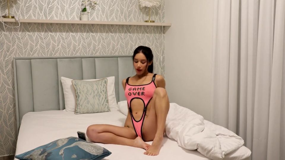 Fashion Raver girl in a festival slut style latest fashion onekini bikini shows her tight pussy and ass