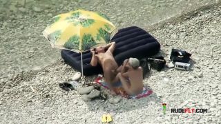 Voyeur on public beach. Hot young couple  sex-1