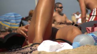 Petite girl gets naked on nudist beach-9
