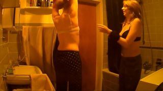 two cute girls changing in the bathroom. hidden cam-0