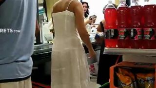 Thong peeks through her white  dress-9