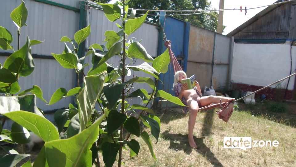 Blonde Masturbates On A Hammock