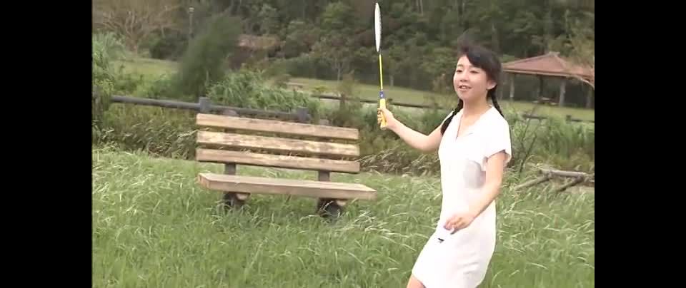 Pure Smile lovely Asian teen in braids poses outdoors International