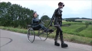 online clip 16 alexis texas femdom Latex Pony Outdoor. Female latex pony slave outdoor dominated by her Mistress using her whip to guide her in pulling a cart so that her owner can have fun being carried in this way, outdoor on fetish porn-4