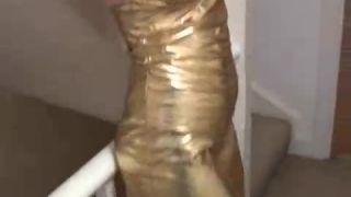 Slut in a gold dress ring gagged-2