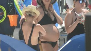 Sexy pregnant woman on the beach-5