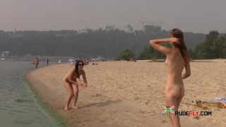 Time for a new day at the beach. A nude beach with beautiful woman all  around.-1