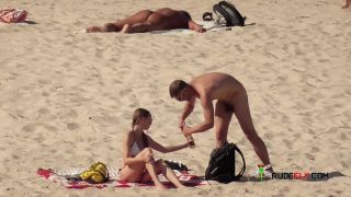 Naturist doll not shy about posing nude at the  plage-3