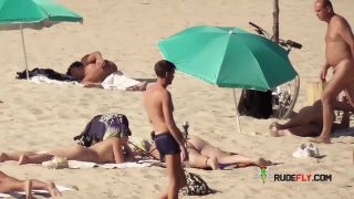 Naturist doll not shy about posing nude at the  plage-8