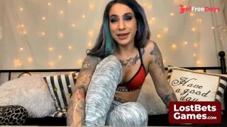 Playful jabs and seductive smiles in a virtual strip game-4